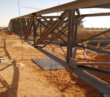 Large steel structure being assembled on a Saudi project site