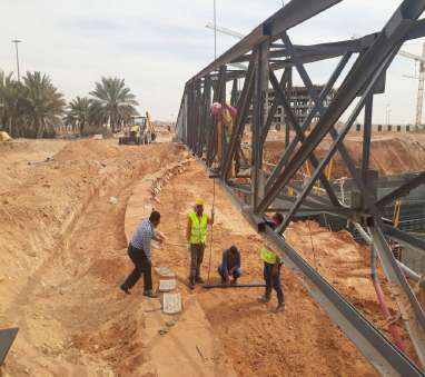 Site crew working beside the fabricated steel assembly